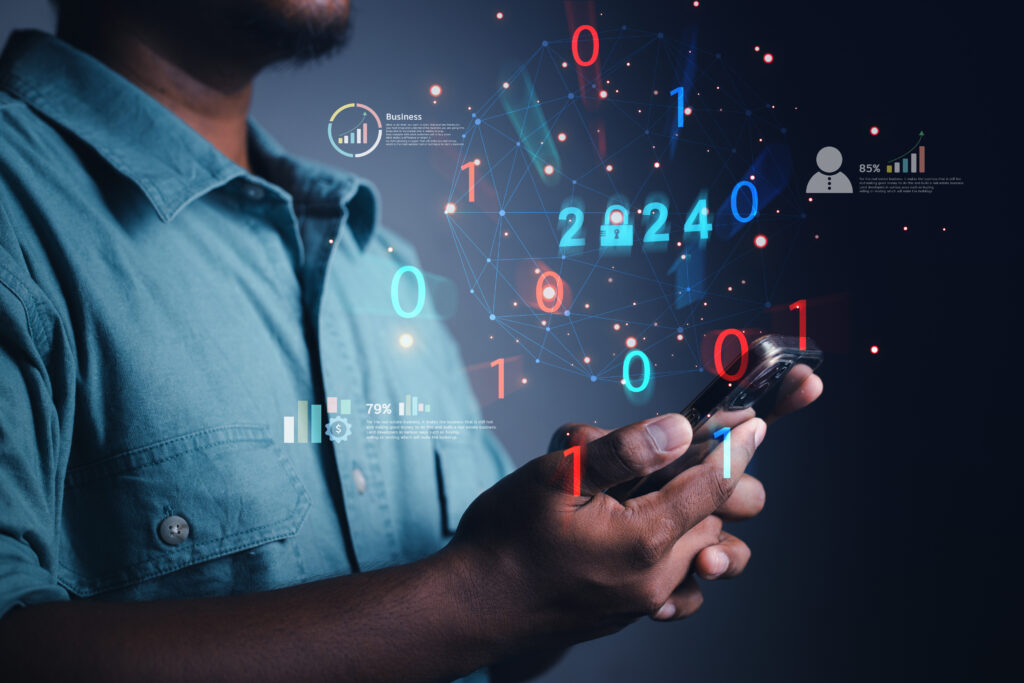 Cybersecurity concept 2024, businessman shows how to protect cyber technology network from attacks by hackers on the internet. Secure access to privacy protection